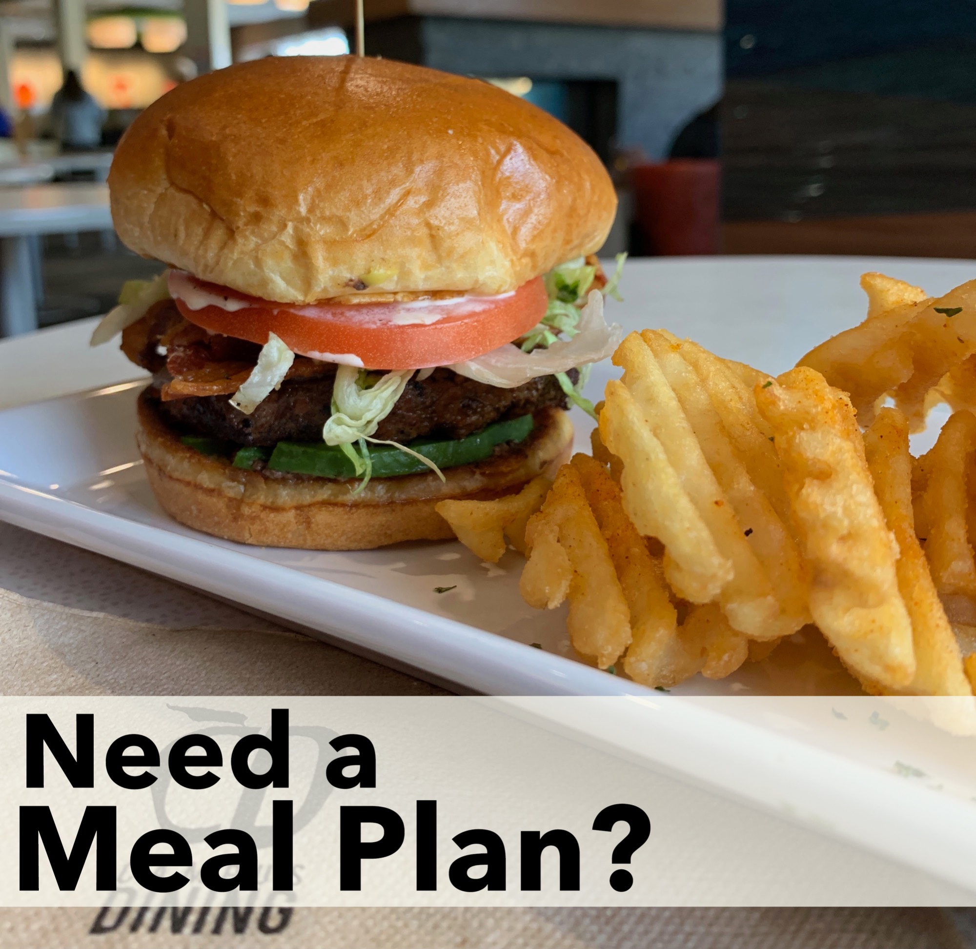 Need a meal plan? Photo of a bacon avocado burger on a plate.